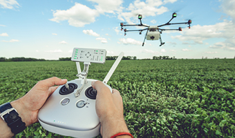 A person flying a drone.