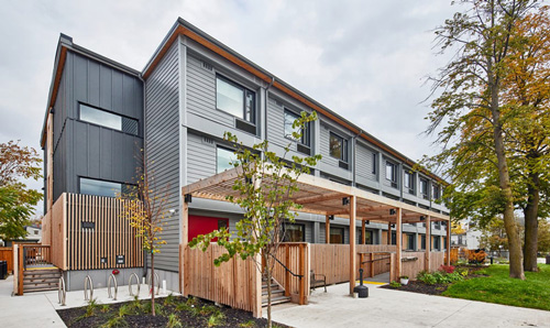 A three-story multi-residential modular building located at 321 Dovercourt Road, Toronto, Ontario