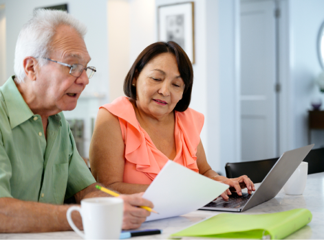 Couple researching information and planning for long-term care