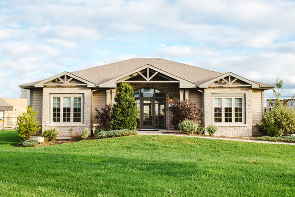 Exterior of a light brick modular house