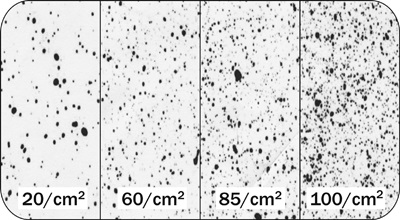 These water-sensitive papers illustrate a range of coverage from 20-100 fine-to-medium droplets/cm2