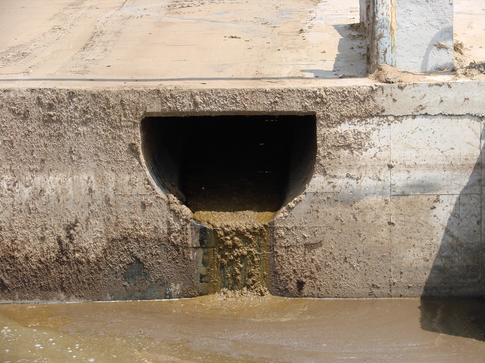 Alternate design of gravity transfer pipe using half of pipe for bottom of trench