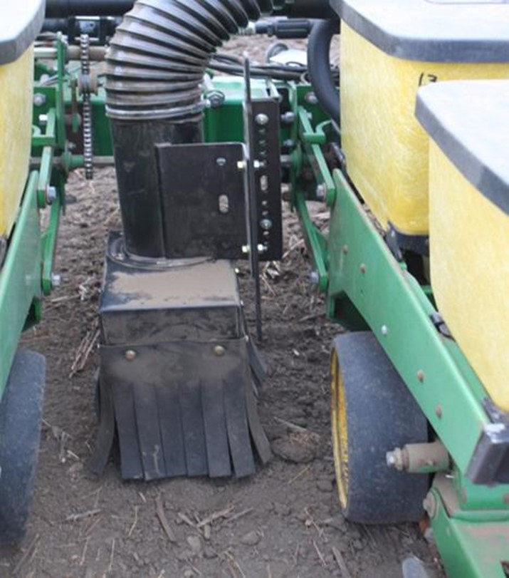 A planter showing expansion box and bristles.