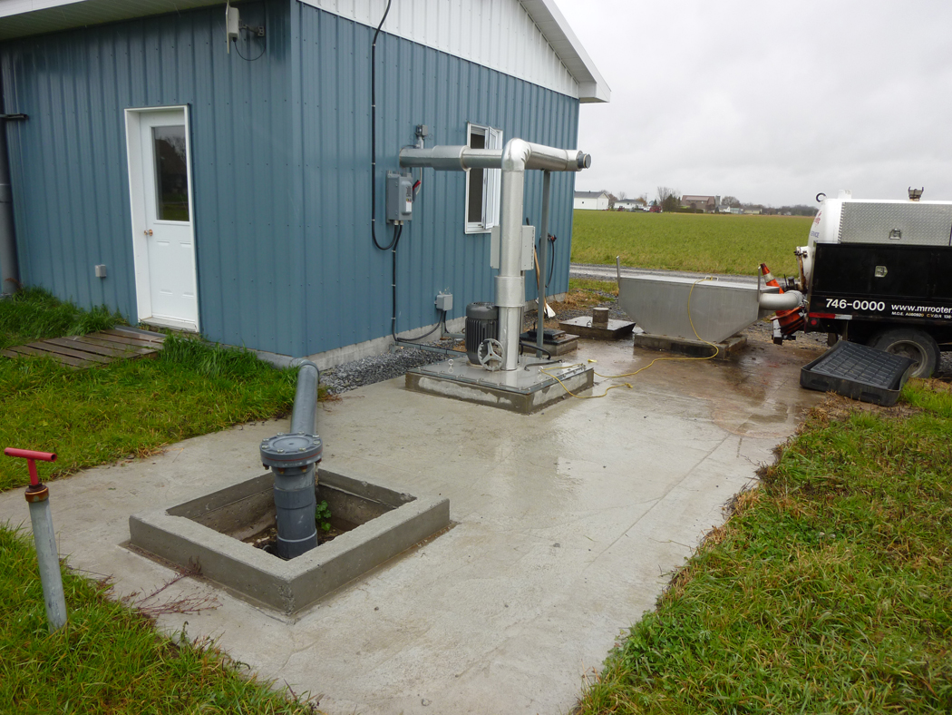 The in-ground co-substrate input tank where liquid off-farm materials such as fats, oils and grease are stored temporarily.