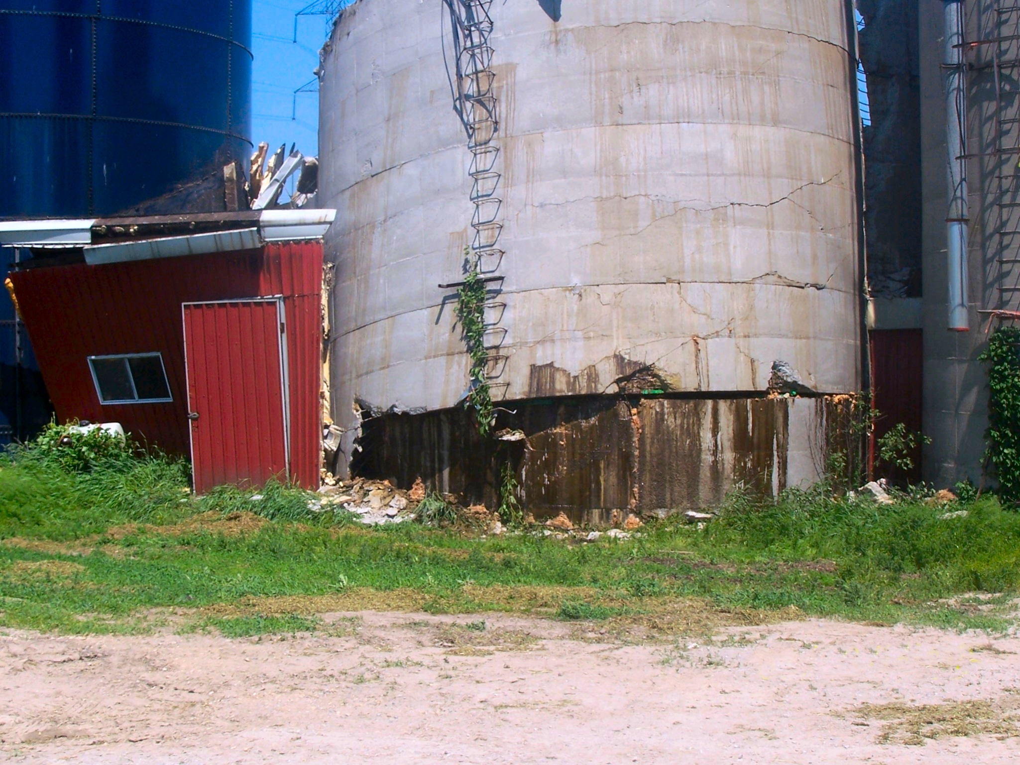 Seepage that can occur when a silo is filled with material that has a higher than normal moisture content; this corrosive liquid can damage the concrete and the reinforcing steel