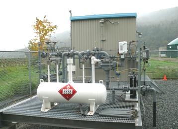 Système d’injection utilisé pour pomper le gaz naturel renouvelable dans une conduite de gaz naturel dans un système de biogaz à la ferme.