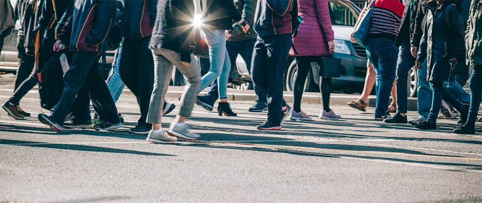 People crossing road in the city.