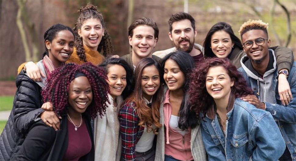 Diverse group of people smiling.