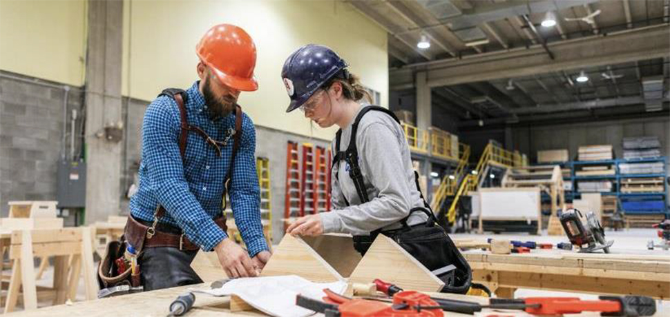 Workers in a lumber shop.