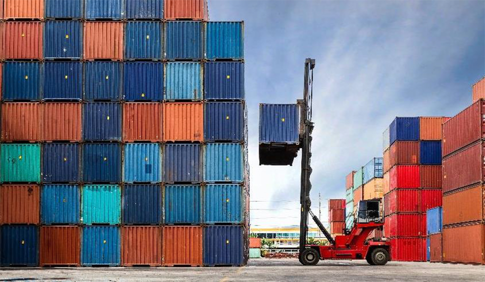 Image of stacked shipping containers.