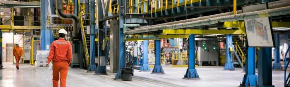 Workers in a manufacturing facility.