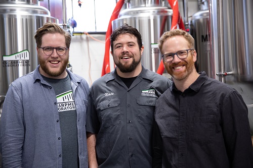 Escarpment Labs co-founders: Richard Preiss, Nate Ferguson, Angus Ross, standing in front of yeast bioreactors at their Guelph facility. This photo was provided by Escarpment Labs.