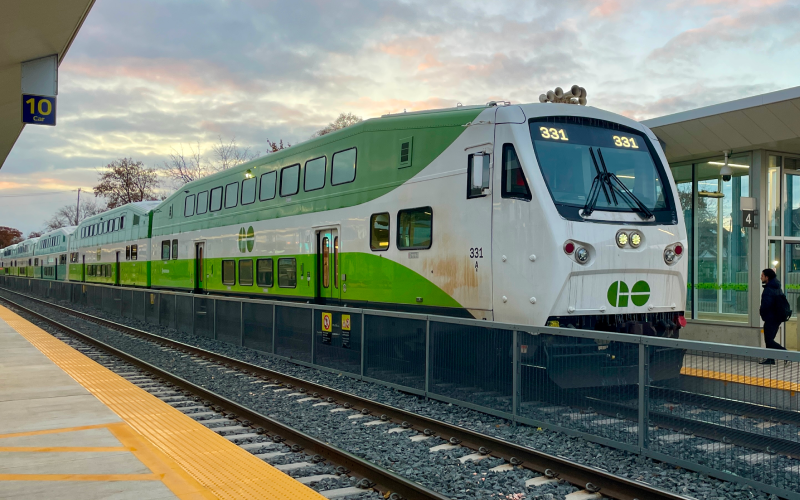 A GO train at a station platform.