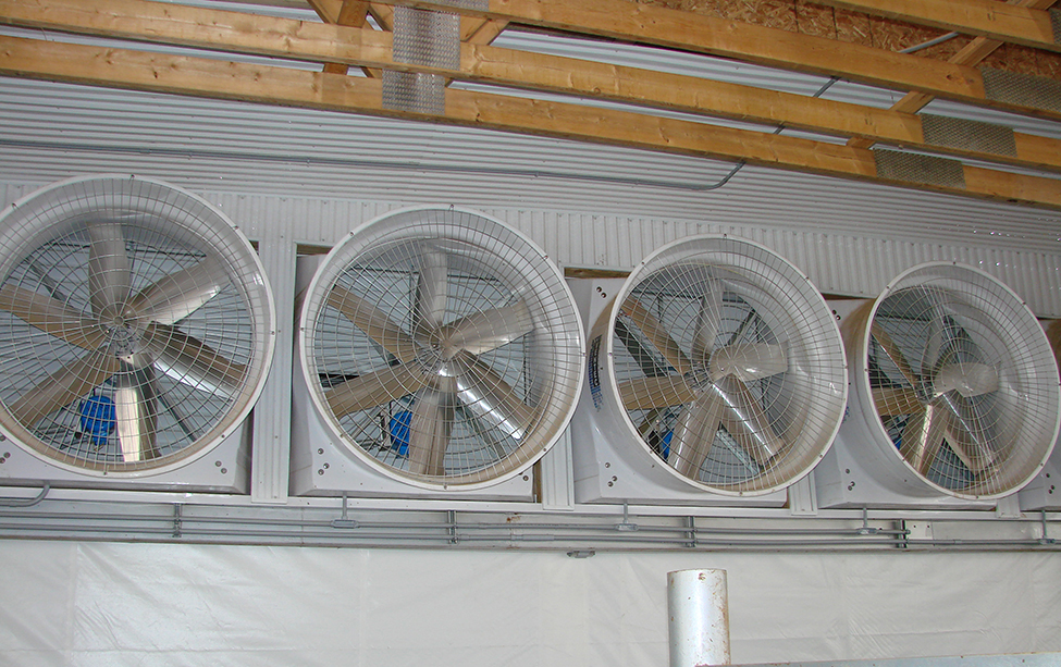 Figure 9 shows four large wall-mounted fans.