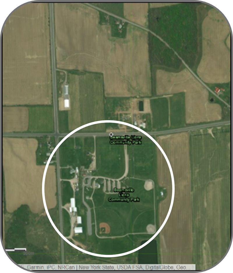 Aerial view of a community park surrounded by farmland within a prime agricultural area. A circle highlights the park.