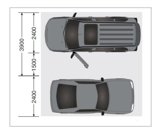 Plan view of two adjacent vehicle parking spaces 2,400 mm wide by 3,900 mm long, one with a side door open into a 1,500 mm wide shared access aisle intended for barrier-free parking.